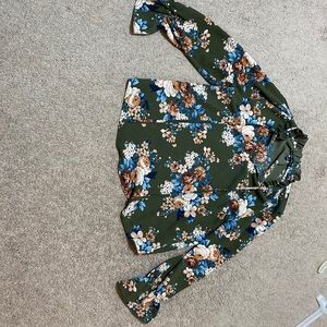 Floral polyester shirt, had laces to tie and style.